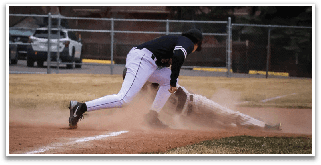A baseball player slides into a base, while another player tries to catch the ball. AI generated content