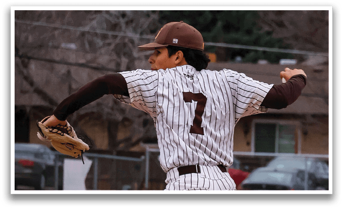 A baseball player in a striped uniform is pitching a ball on a field. AI generated content