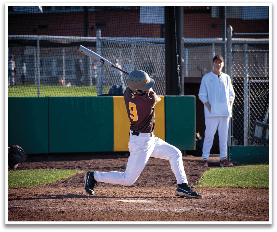 A baseball player in a brown and yellow uniform is swinging a bat at a ball. AI generated content