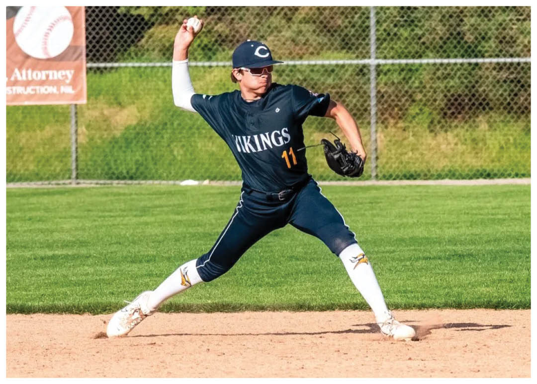 A baseball player in a blue uniform is pitching a ball on a field. AI generated content