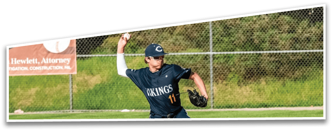 A baseball player in a blue uniform is pitching a ball on a field. AI generated content