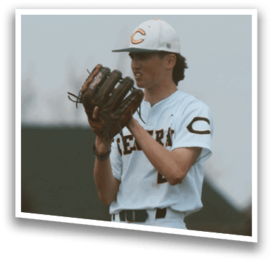 A baseball player stands on a pitcher's mound, holding a baseball glove and preparing to throw the ball. AI generated content
