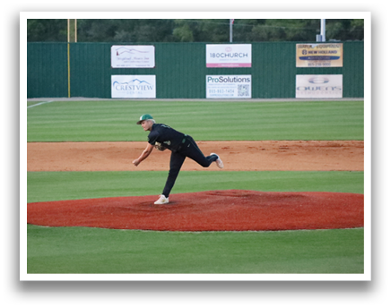 A baseball player in a black shirt and green hat is pitching a ball on a field. AI generated content