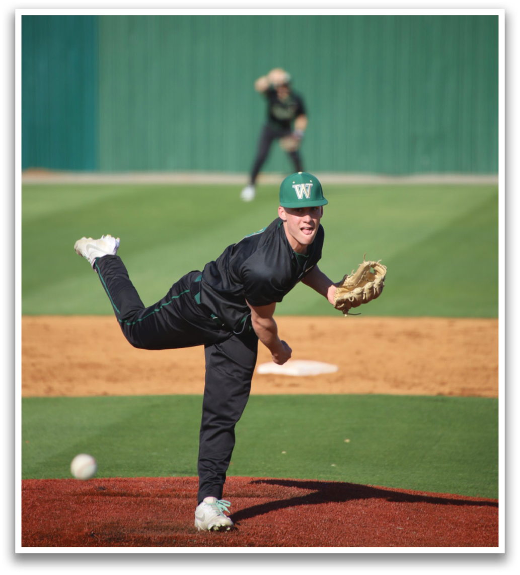 A baseball player in a black shirt and green hat is diving to catch a ball. AI generated content