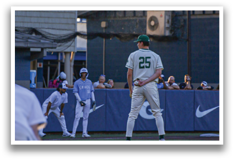 A baseball player in a white uniform stands on the pitcher's mound, preparing to throw the ball. AI generated content