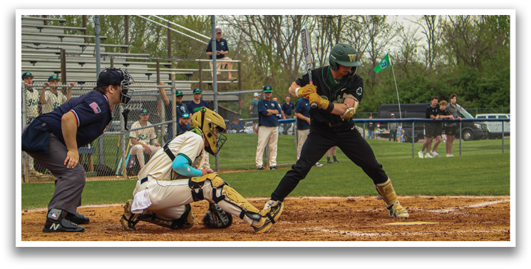 A baseball game is in progress with a batter swinging at a pitch. The catcher is ready to catch the ball, and the umpire is closely watching the play. There are several other players on the field, some of whom are wearing baseball gloves. The scene takes place on a baseball field with a bench in the background. AI generated content