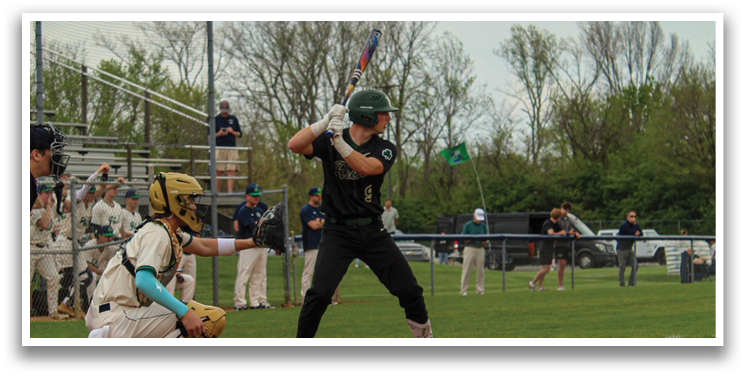 A baseball player is at bat, holding a bat and preparing to swing. AI generated content