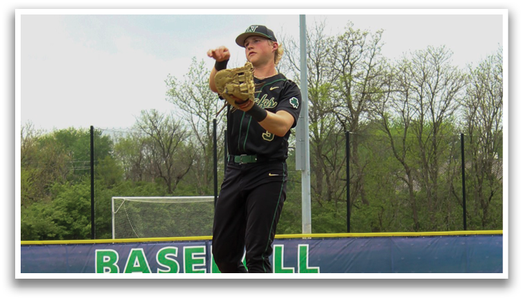 A baseball player is standing on the field, wearing a black shirt and holding a baseball glove. AI generated content