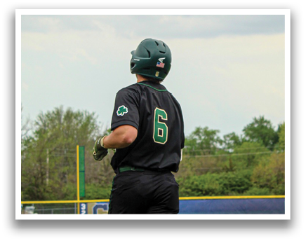 A baseball player wearing a green and black uniform stands on the field. AI generated content
