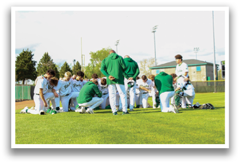 A group of baseball players huddle together on the field. AI generated content
