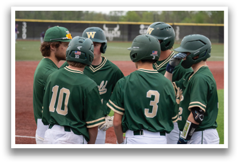 A group of baseball players wearing green and white uniforms are standing on a field. AI generated content