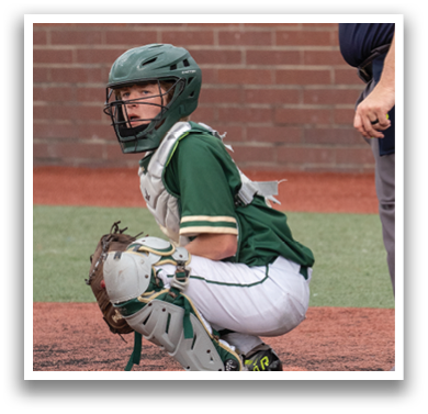 A young boy is crouching behind a catcher's mitt, ready to catch a ball. An umpire is standing nearby, watching the game. AI generated content