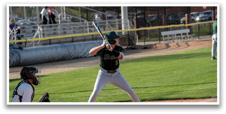 A baseball player is at bat, holding a bat and preparing to swing. AI generated content