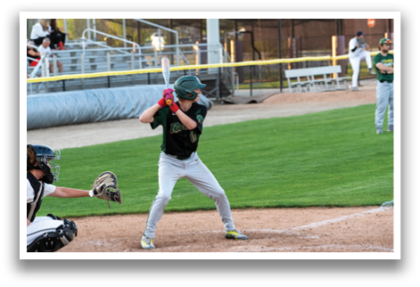 A baseball player is at bat, holding a bat and preparing to swing. AI generated content