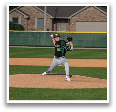 A baseball player in a green shirt and grey pants is pitching a ball on a field. AI generated content