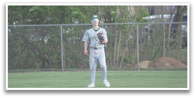 A man wearing a baseball glove stands on a baseball field. AI generated content