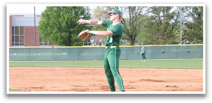 A female baseball player in a green and white uniform is standing on a field, holding her glove up in the air, ready to catch a ball. AI generated content