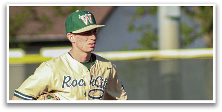 A baseball player wearing a gold and white uniform stands on a field. AI generated content