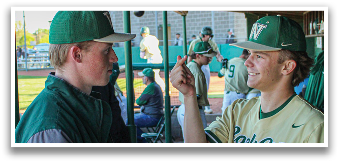 Two men wearing baseball caps and jackets are talking to each other. AI generated content