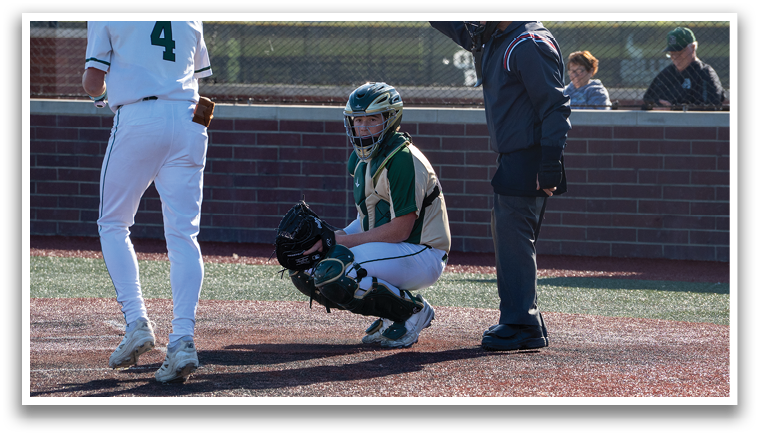 A baseball game is in progress with a batter, catcher, and umpire on the field. The batter is holding a bat, ready to swing, while the catcher is in position behind him. The umpire is also present, closely observing the game. AI generated content