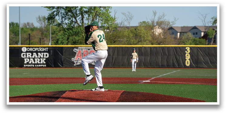 A baseball player in a green shirt and white pants is pitching a ball on a field. AI generated content
