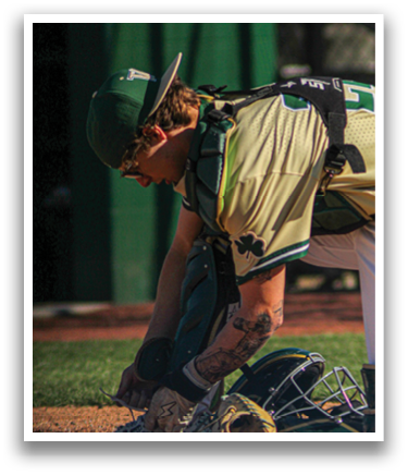 A baseball player bends over to adjust his catcher's mitt. AI generated content