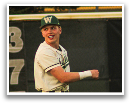 A baseball player wearing a green hat and white uniform is walking on the field. AI generated content