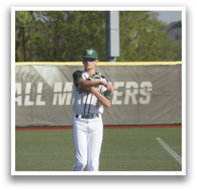A baseball player in a green hat and white uniform stands on a baseball field, holding his glove in the air. AI generated content
