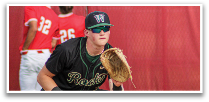 A baseball player wearing a black jersey and a catcher's mitt is ready to catch the ball. AI generated content