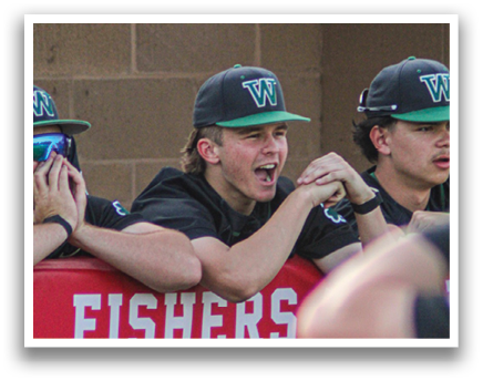 Baseball players from the Fishers team are sitting on the bench, watching the game. AI generated content