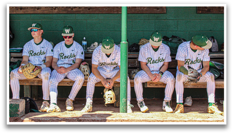 Baseball players sitting on bench, wearing uniforms and hats. AI generated content