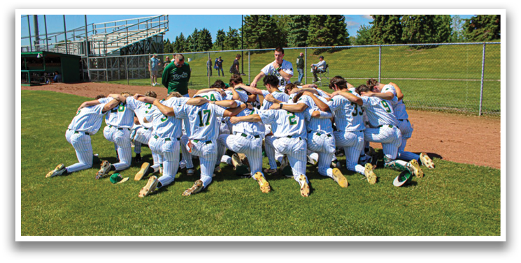 A group of baseball players in uniforms are huddled together on a field. AI generated content