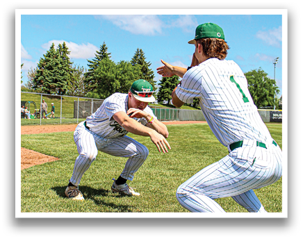 Two baseball players in uniforms are crouching on the grass. AI generated content