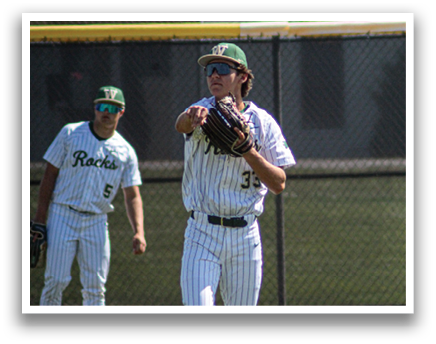 Two baseball players on a field, one wearing a green hat and pointing to the other. AI generated content