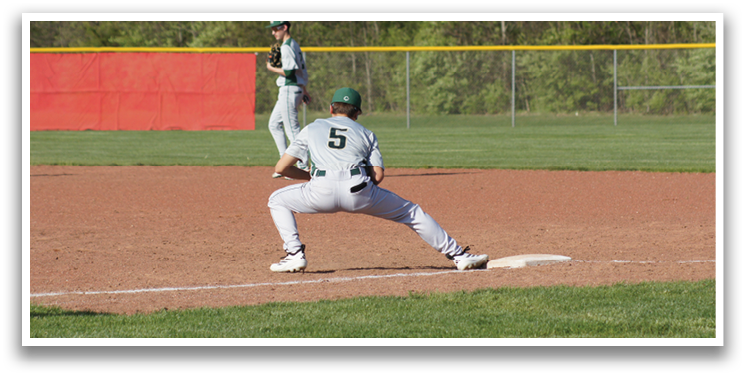 A baseball player is running towards a base, wearing a grey shirt and green shorts. AI generated content