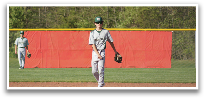 A baseball player in a grey and white uniform is standing on a field, holding a baseball glove. AI generated content
