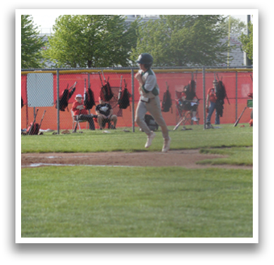 A baseball game is in progress with a batter, catcher, and umpire. The batter is swinging at a pitch, while the catcher and umpire are in position. There are several other players on the field, some of whom are wearing baseball gloves. The scene captures the excitement and intensity of the game. AI generated content