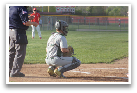 A baseball player is kneeling down in the dirt, wearing a helmet and a catcher's mitt. AI generated content