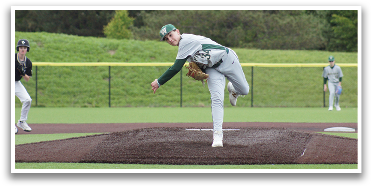A baseball player in a green and white uniform is pitching a ball. Description generated by AI