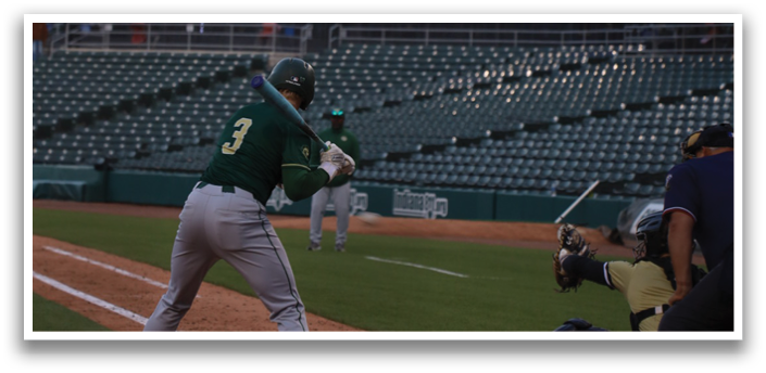 A baseball player is swinging a bat at a ball. Description generated by AI