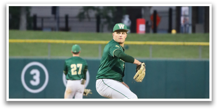 A baseball player in a green shirt and white pants is pitching a ball. Description generated by AI