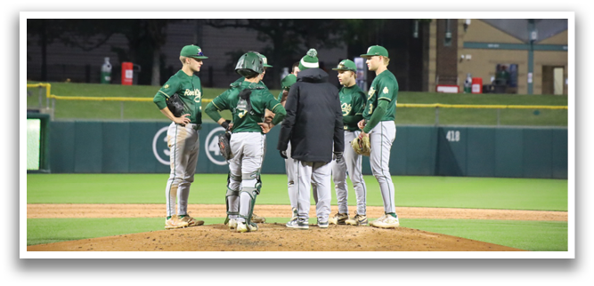 A group of baseball players on a field. Description generated by AI