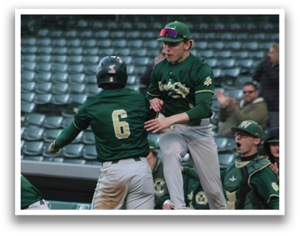 A group of baseball players celebrating a win. Description generated by AI