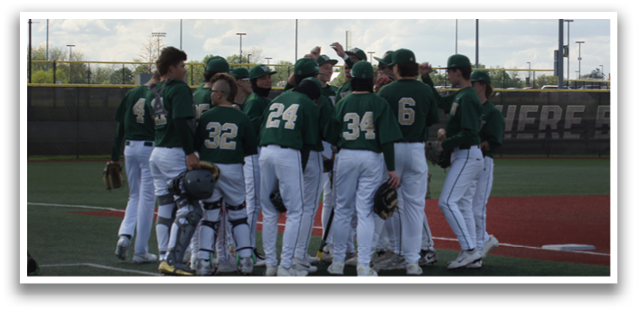 A group of baseball players huddled together on a field. Description generated by AI