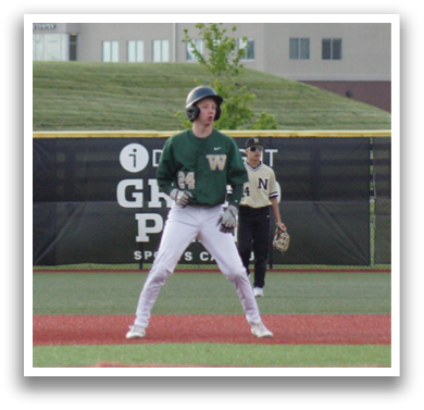 A baseball player is standing on a field. Description generated by AI
