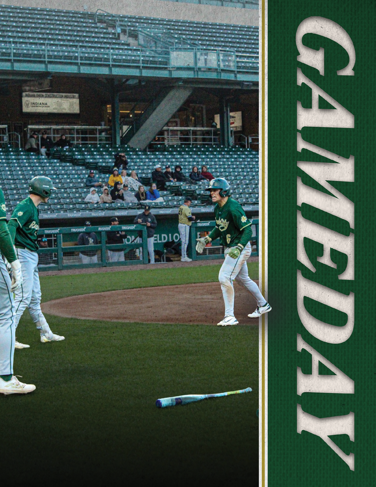 A baseball player holding a bat. Description generated by AI