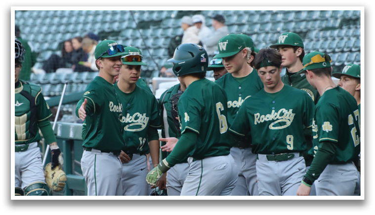 Baseball players in green and grey uniforms. Description generated by AI