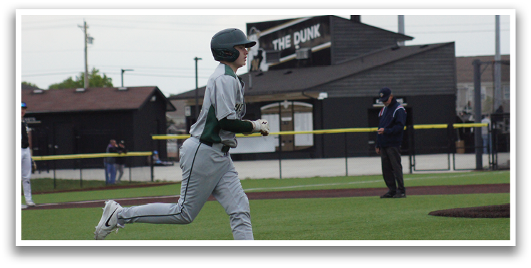 A baseball player running on the field. Description generated by AI