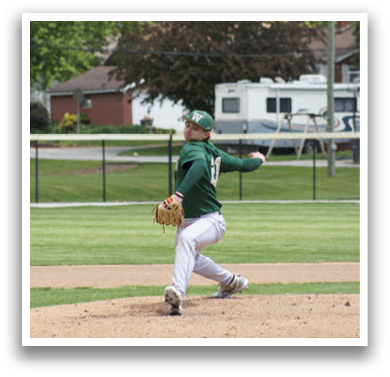 A baseball player in a green and white uniform is on the mound. Description generated by AI