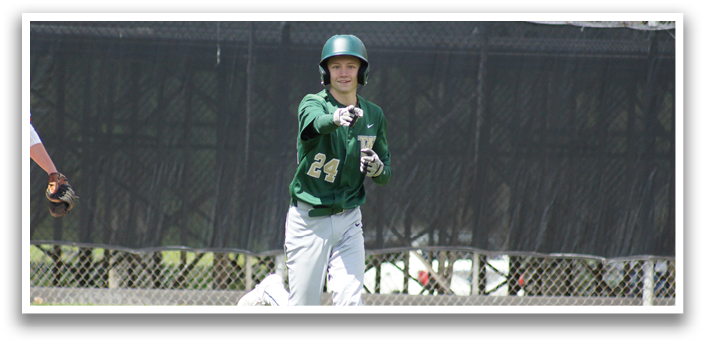 A baseball player wearing a green and white uniform is running to a base. Description generated by AI